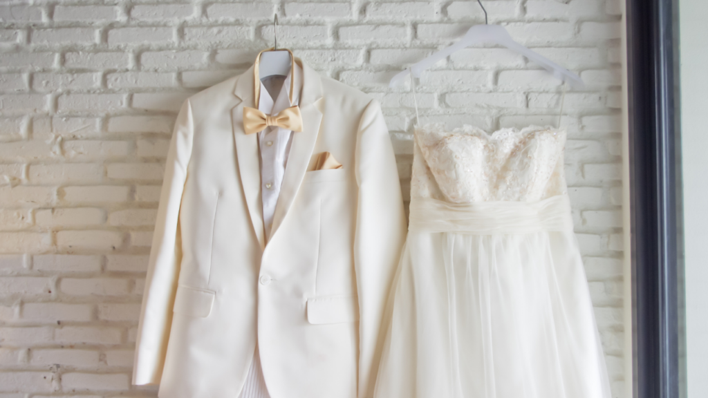 bride and groom white outfit