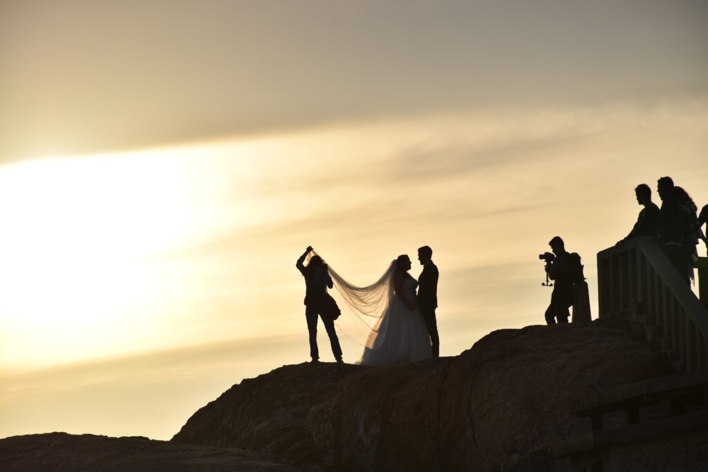 wedding photographer at sunset