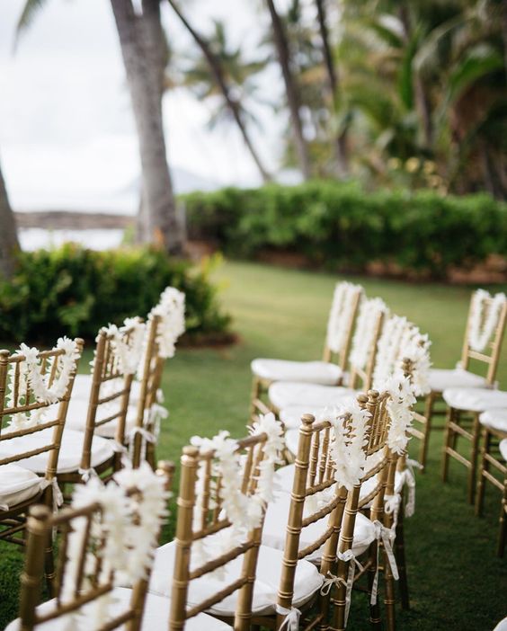 white leis at hawaiian wedding